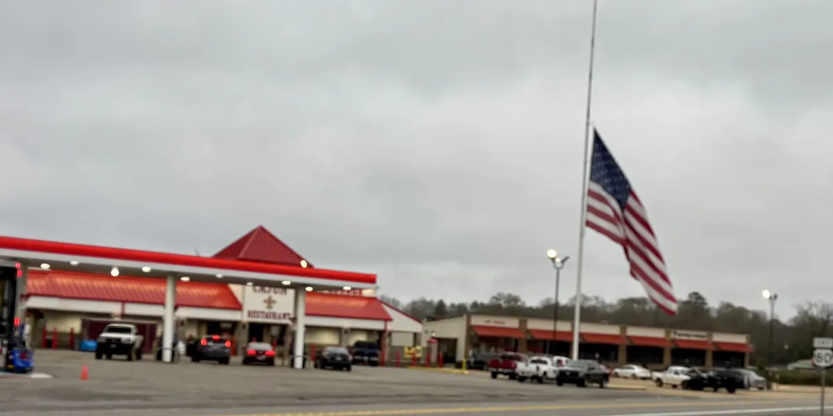 Roadside Cajun restaurant with clean dining area where travelers enjoy hearty Southern dishes, featuring both restaurant...