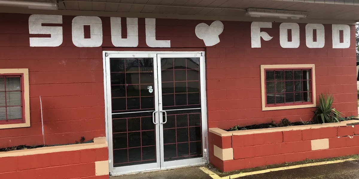 Clean, spacious soul food restaurant with indoor and outdoor seating options along Renwick Street in a casual,...