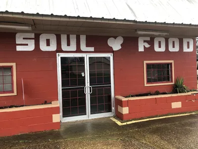 Clean, spacious soul food restaurant with indoor and outdoor seating options along Renwick Street in a casual,...