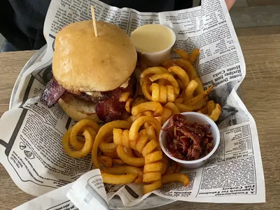 Waterfront restaurant with outdoor deck overlooking Ouachita Bayou, serving Southern comfort food in a casual riverside...