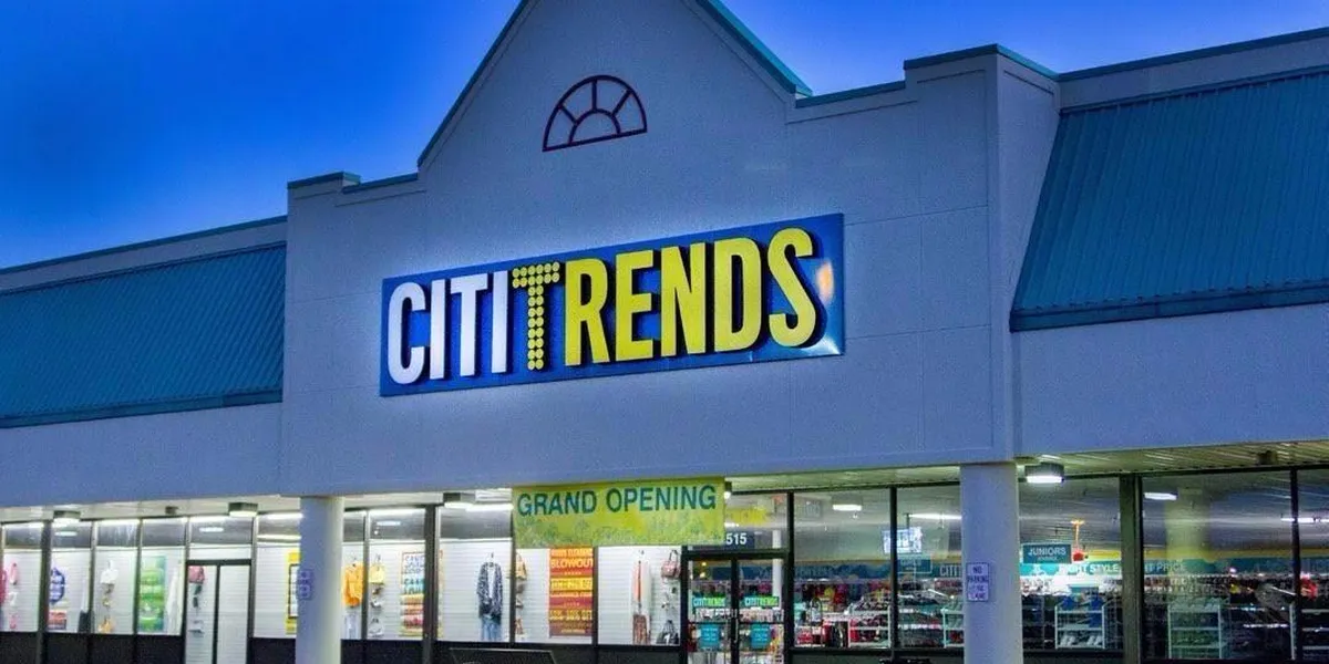 Spacious retail floor at Citi Trends with organized racks of affordable clothing, home goods, and accessories in a...