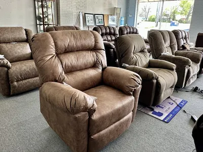Spacious showroom of Daniel Appliance & Furniture on Louisville Ave featuring arranged furniture sets and major appliance...