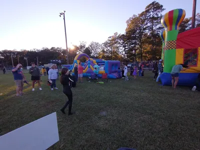 Brightly lit ballfields at East Ouachita Recreation Center with well-maintained grounds and community gathering spaces.