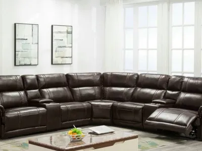 Showroom of Easy Living Furniture displaying bedroom and dining sets arranged in a small-town retail space with...