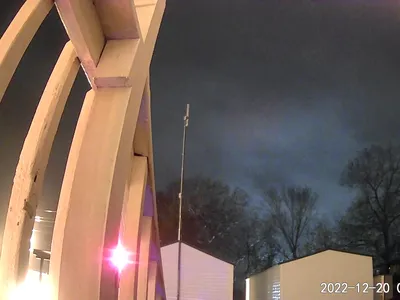 Neat rows of mobile homes with dedicated parking spaces at Greenfields Community, showcasing a well-organized residential...