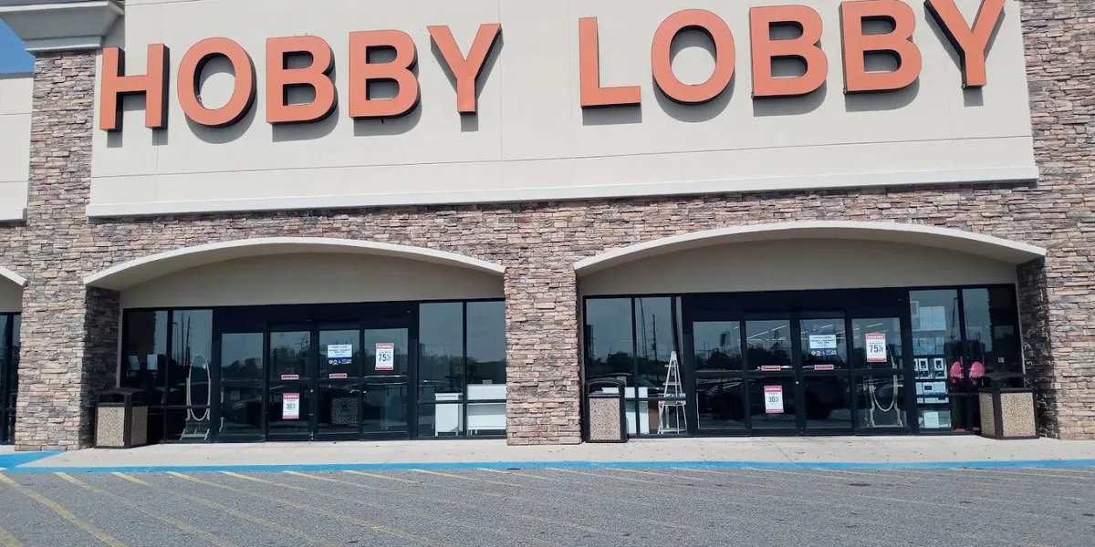 Spacious, well-organized craft store with abundant seasonal displays, home decor sections, and multiple checkout lanes...