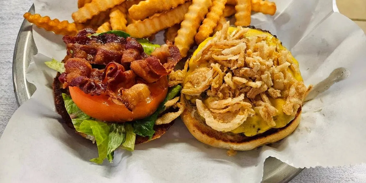 Casual family-owned restaurant with outdoor seating area, serving burgers on sourdough bread and loaded appetizers in...