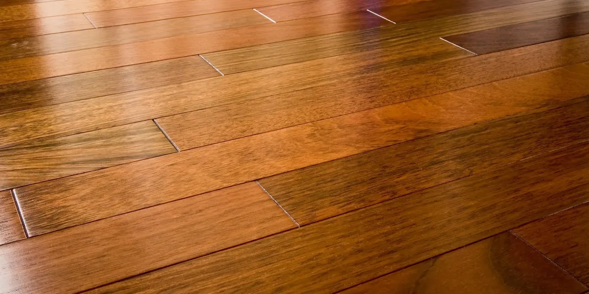 Bright showroom displaying diverse flooring samples with helpful staff assisting customers in a well-organized selection...