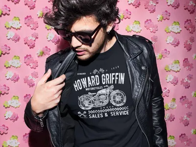 Eclectic retail space showcasing vintage clothing racks, Christian-themed apparel, and BMX parts with an...