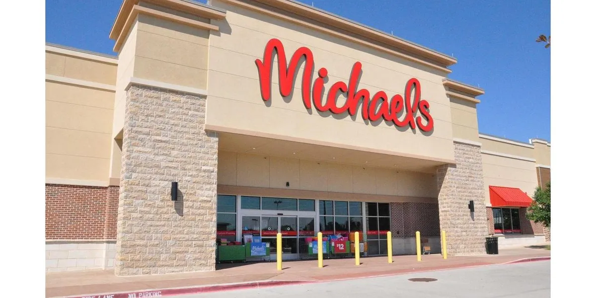 Organized craft store with packed aisles of art supplies, seasonal decorations, and crafting materials in a bright retail...