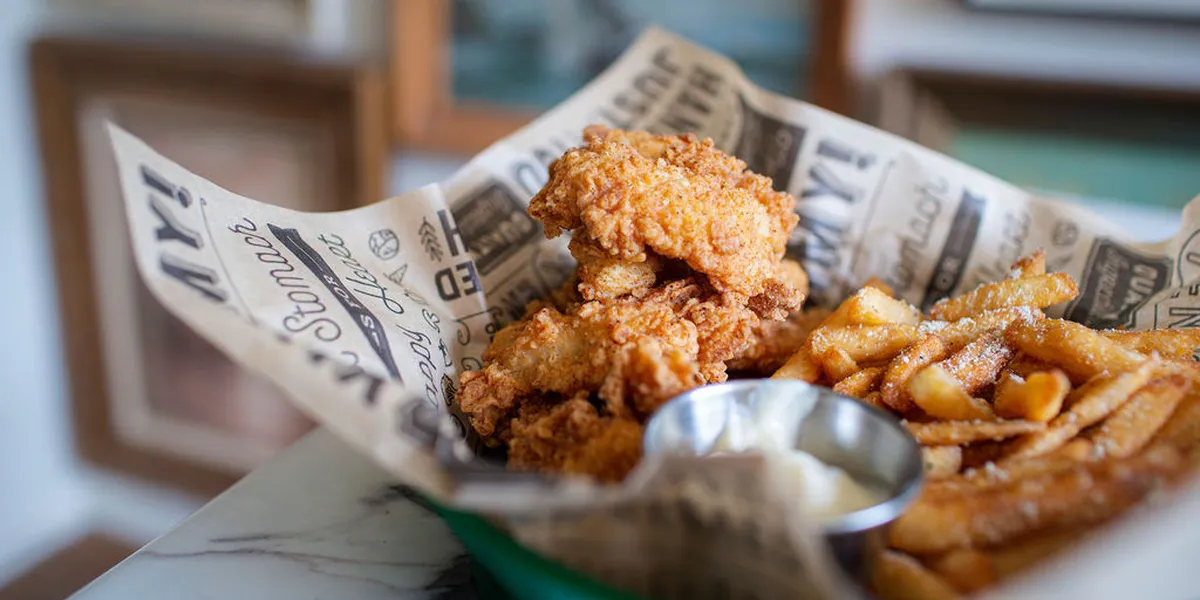 Quaint themed dining rooms with good lighting at Okaloosa, featuring intimate tables and a relaxed, romantic atmosphere...