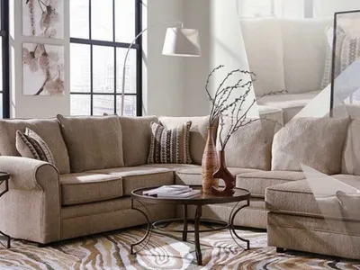 Sparsely stocked furniture showroom in downtown Monroe with a mix of home furnishing pieces displayed in an open floor...