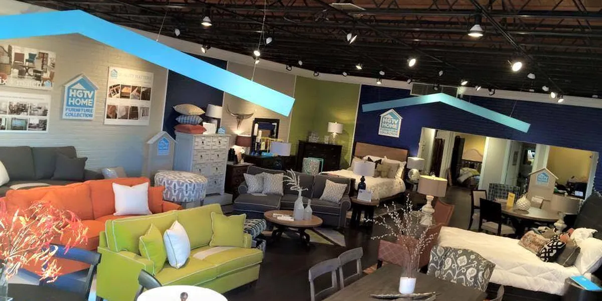 Spacious showroom with arranged furniture vignettes showcasing custom home and patio collections at Sleepy Hollow...