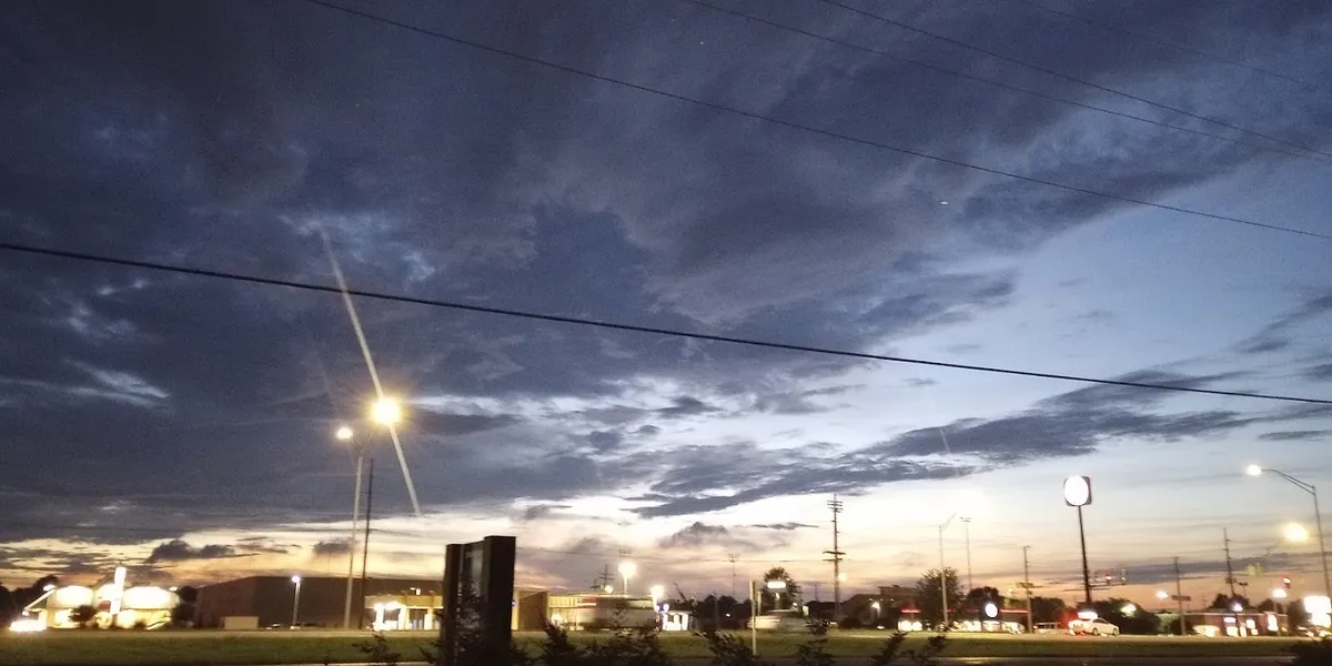 Elegant interior of Southgate Shopping Center displaying organized furniture collections with couches, recliners, and...