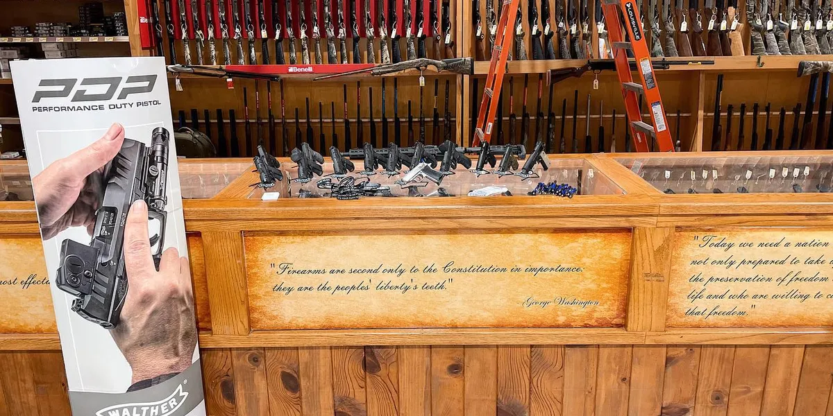 Traditional sporting goods store with hardware section and gun counter, featuring wooden displays and a classic...