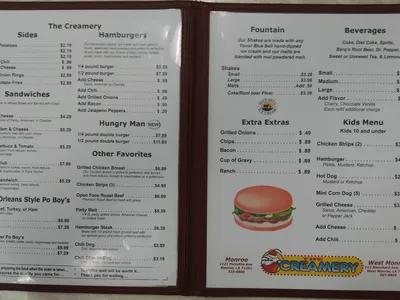 Retro 50's-style diner with nostalgic decor, serving smash burgers and ice cream at counter and booth seating in West Monroe.