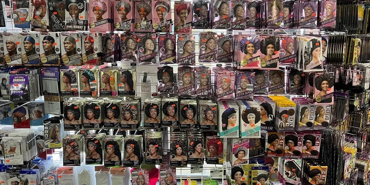 Well-stocked interior of Z Mart furniture store showing organized displays of diverse household items and uniforms in a...