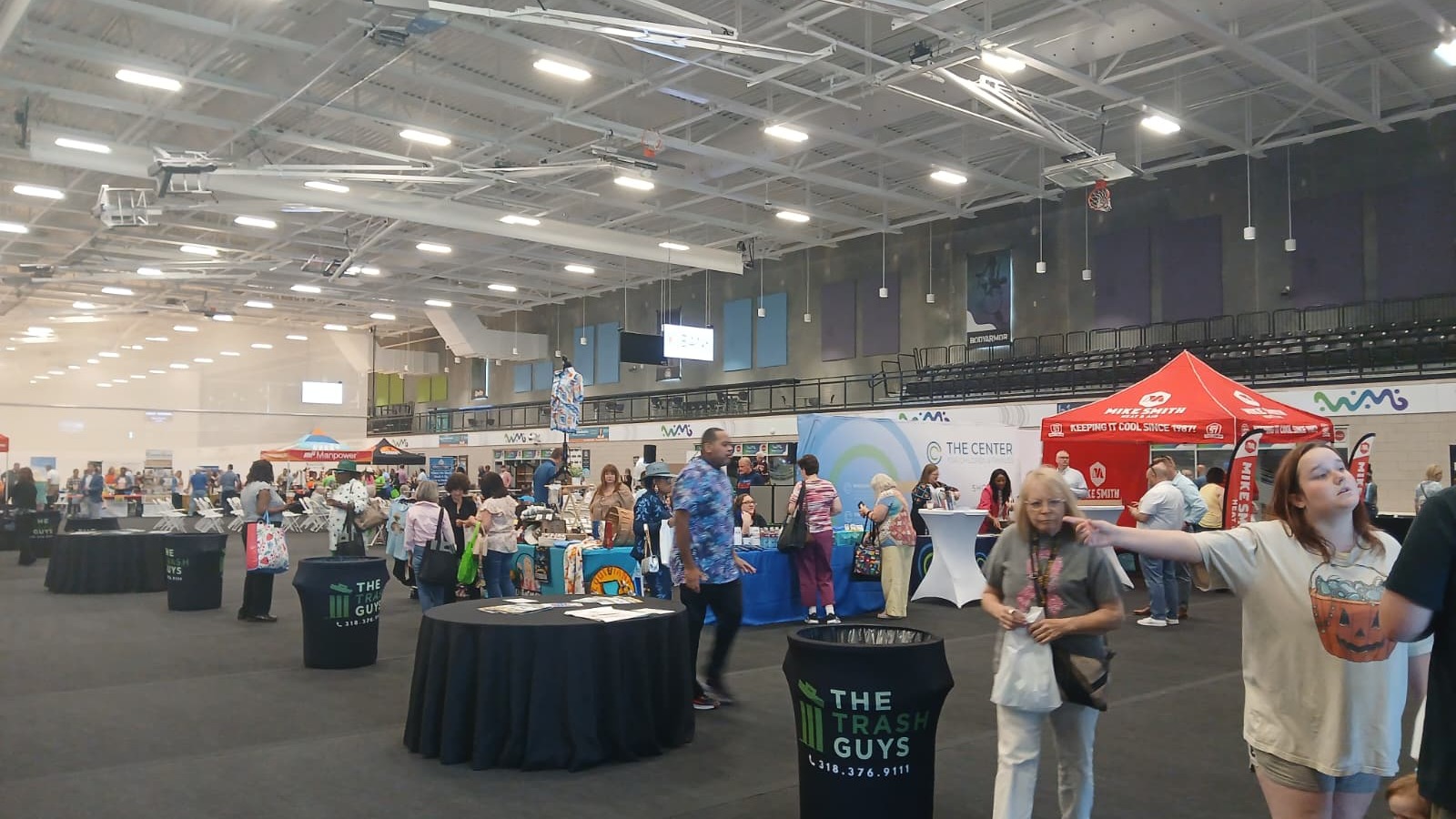 Annual Business Expo 2026 floor at West Monroe Sports and Events Center, hundreds of attendees and 100+ local business booths
