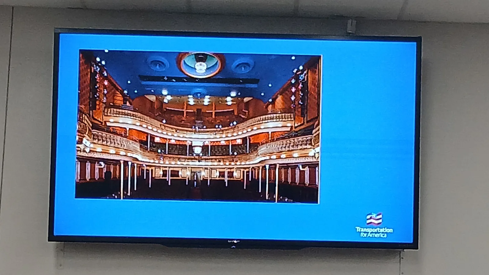 A presentation slide showing the ridership and revenue summary for the proposed passenger rail service.