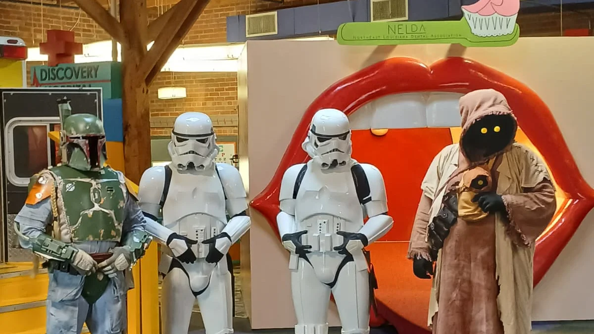 Boba Fett, two Stormtroopers, and a Jawa from the 501st Legion at the Northeast Louisiana Children's Museum in Monroe