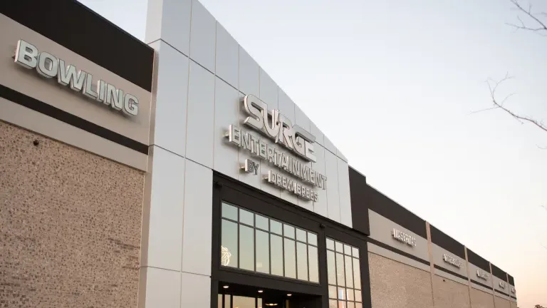Surge Entertainment by Drew Brees in West Monroe Louisiana, a modern entertainment center with bowling, laser tag and arcade signage