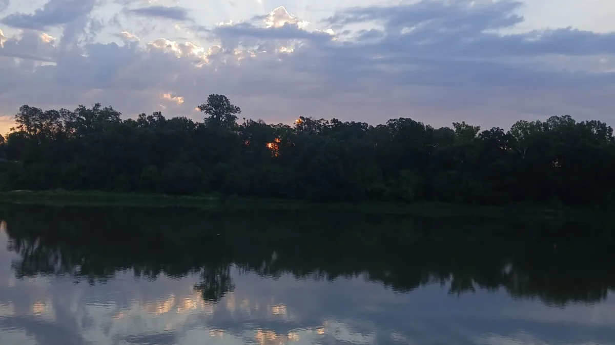 Sunrise over the Ouachita River at Lazarre Park during the West Monroe Gar Rodeo in West Monroe, Louisiana.